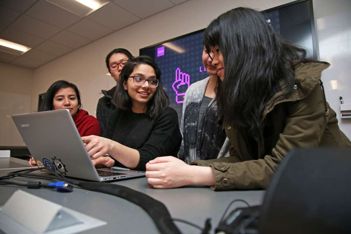 Students around a computer